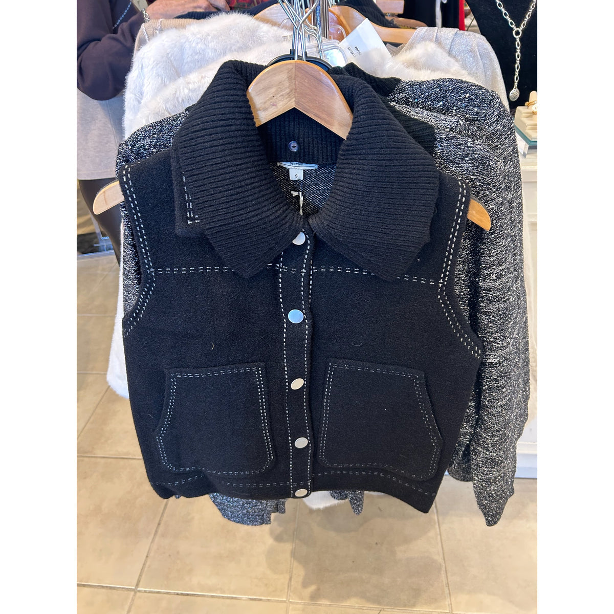 Metric Knits Black and Ivory Snap-Front Vest, original front and back views.